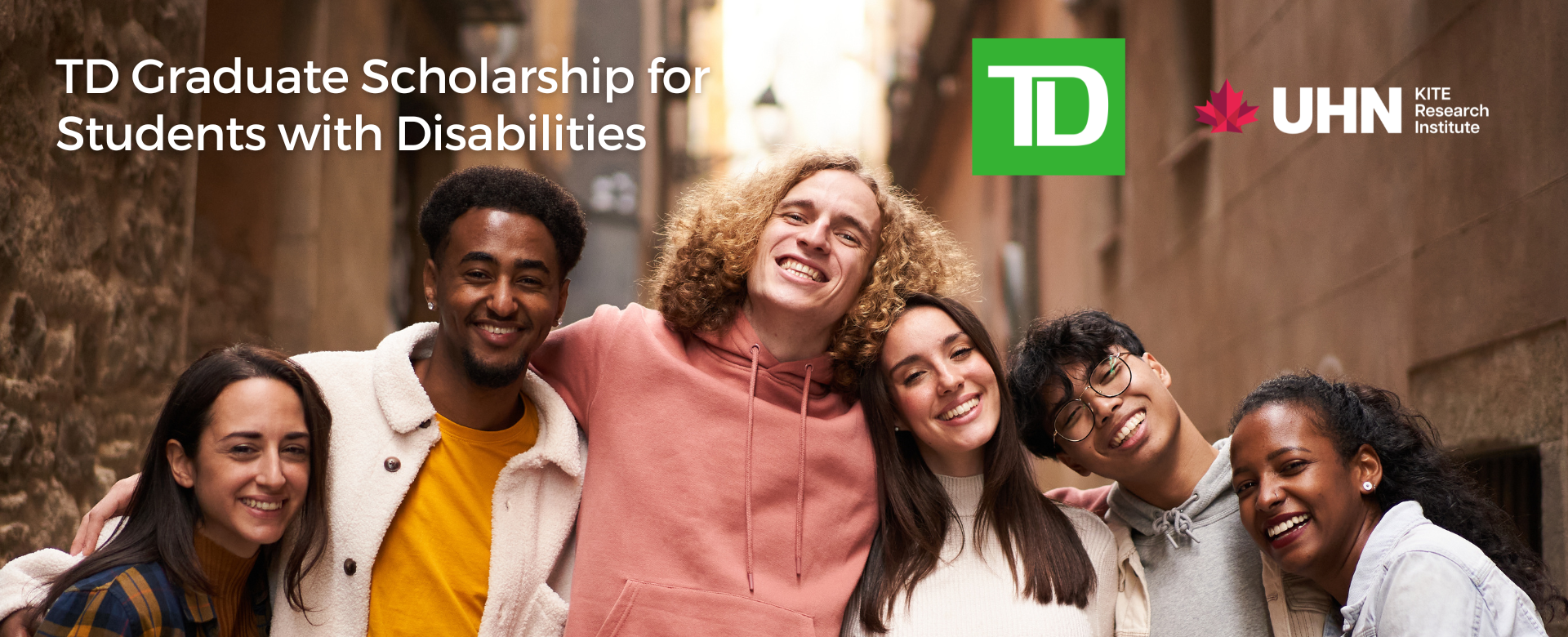 Six young people hugging and smiling. 